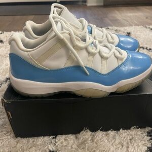 Jordan 11 Retro White and Blue Sneakers